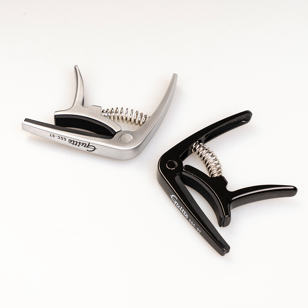 GUITTO GGC-07 Ukulele Capo Qui - огляд і ціна Musical Instrument In English